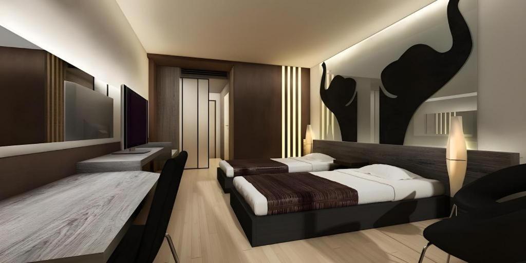 Alvarez Hotel Buriram Buitenkant foto