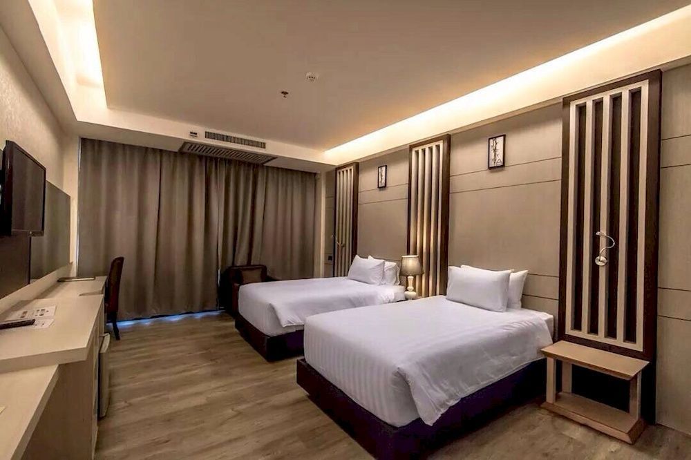 Alvarez Hotel Buriram Buitenkant foto
